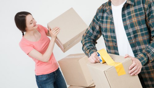 Removal team handling a high-rise apartment move in Canary Wharf