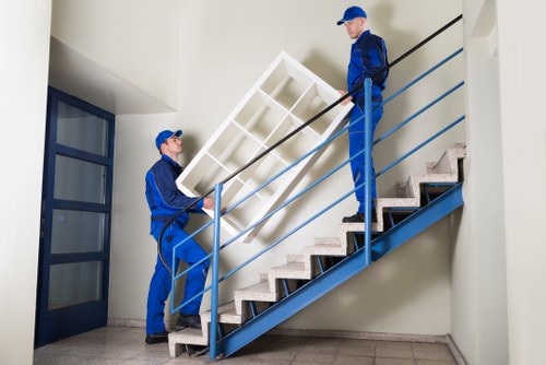 Collection of bulky household furniture in a modern Canary Wharf flat
