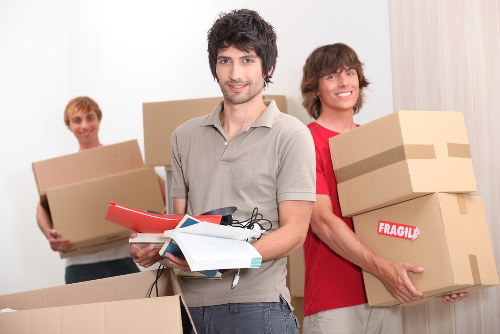 Service team assessing a moving complaint and checking records
