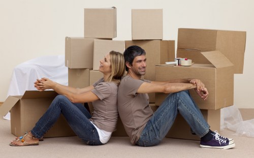 Careful loading of sofas and bulky items for a Canary Wharf move
