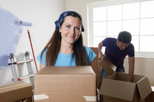 Packed household boxes and furniture prepared for a local move