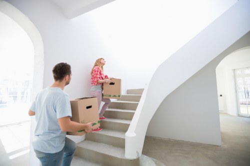 Unpacking support in a Canary Wharf home after moving day