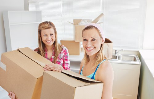 Careful furniture loading for a Canary Wharf home relocation