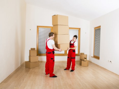 Packed boxes and furniture ready for same day removals in Canary Wharf